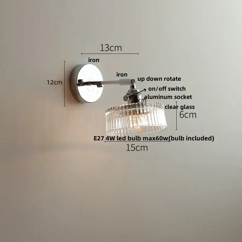 A vintage chrome clear glass wall sconce with a sleek chrome finish and chandelier style for bedroom decorbites clear glass