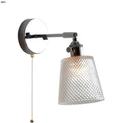 A vintage chrome clear glass wall sconce with textured glass shade and pull chain for bedroom decorbites clear glass
