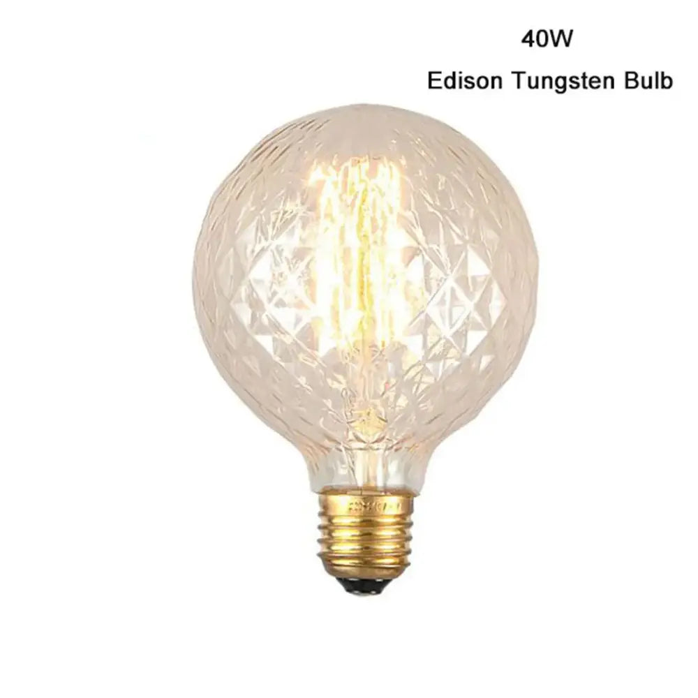 A vintage clear faceted led globe edison bulb with a brass screw base dimmable 4w led for living room lighting