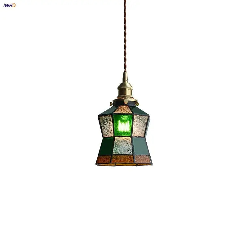 Vintage colorful glass Tiffany pendant lamp with brass fixture featuring green amber and teal panels for dining room decorbites colorful glass