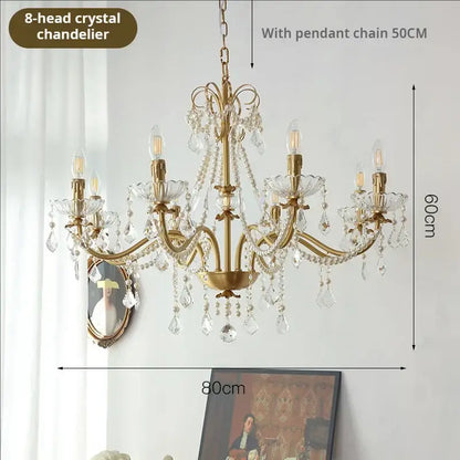 Elegant gold-toned 8-head crystal pendant light with clear crystals and exposed bulbs in decorbites copper chandelier style