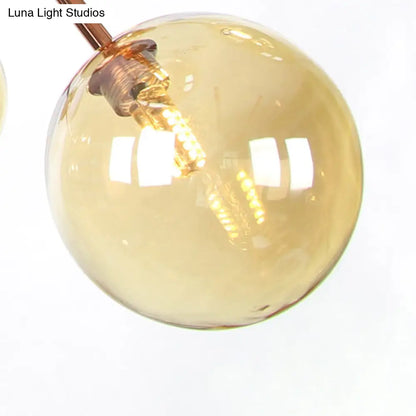 Lámpara de araña vintage de cobre con pantallas esféricas de cristal transparente/ámbar - 3/9/12 luces, diseño de ramas - 33/70/86 cm de ancho