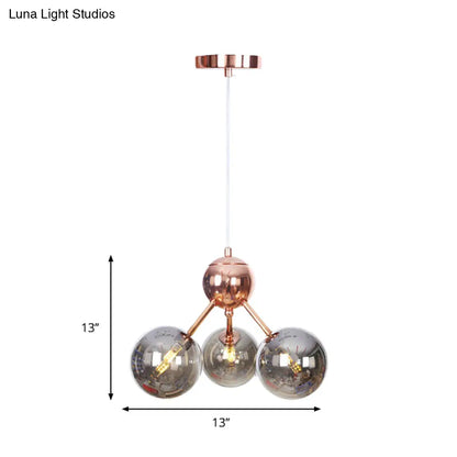 Lámpara de araña vintage de cobre con pantallas esféricas de cristal transparente/ámbar - 3/9/12 luces, diseño de ramas - 33/70/86 cm de ancho