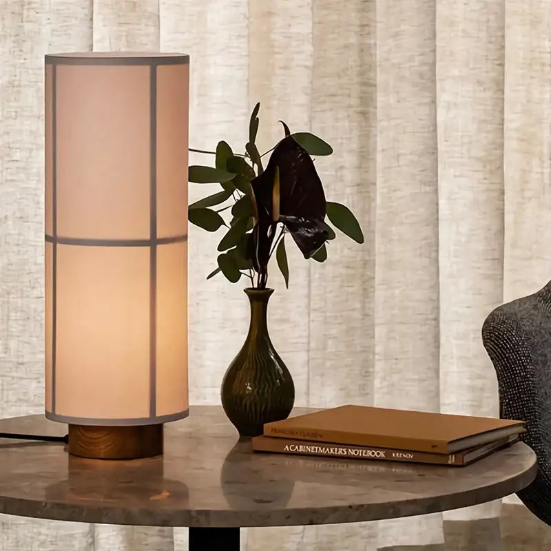 Vintage cream fabric hashira cluster pendant light featuring a warm-toned cylindrical table lamp with wooden base decorbites hashira cluster