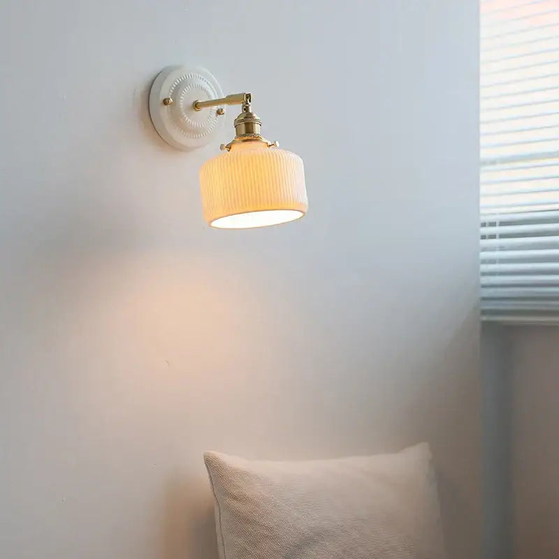 Vintage cream ribbed glass ceramic led wall lamp with brass accents for bedroom decorbites ceramic led wall lighting
