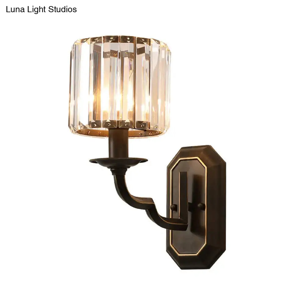 Vintage dark bronze wall light with clear crystal cylindrical shade and octagonal backplate for e12 e14 bulbs in bedroom