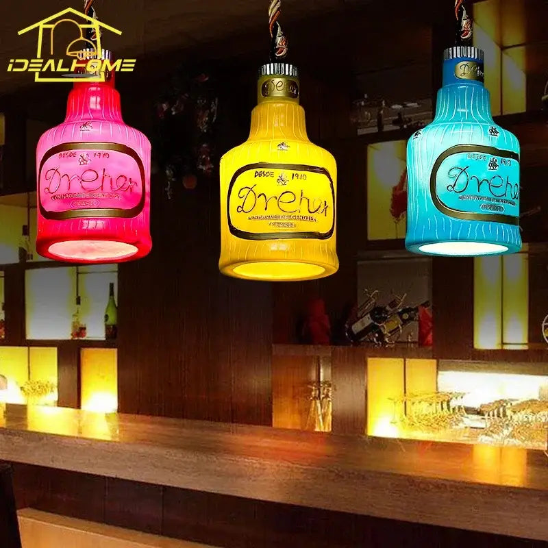 Vintage dreher glass bottle pendant lights illuminate in colors creating a decorbites atmosphere glass ambiance above bar counter