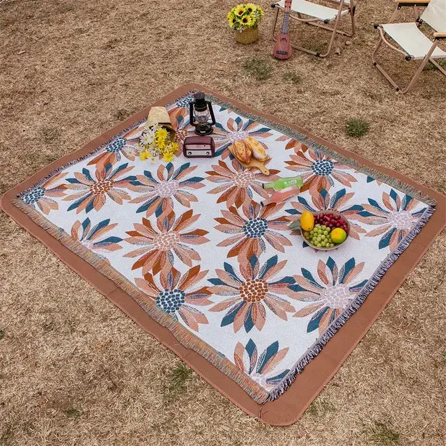 A white bohemian cotton plaid sofa blanket with vibrant orange blue floral pattern and fringed edges for living room decorbites bohemian cotton