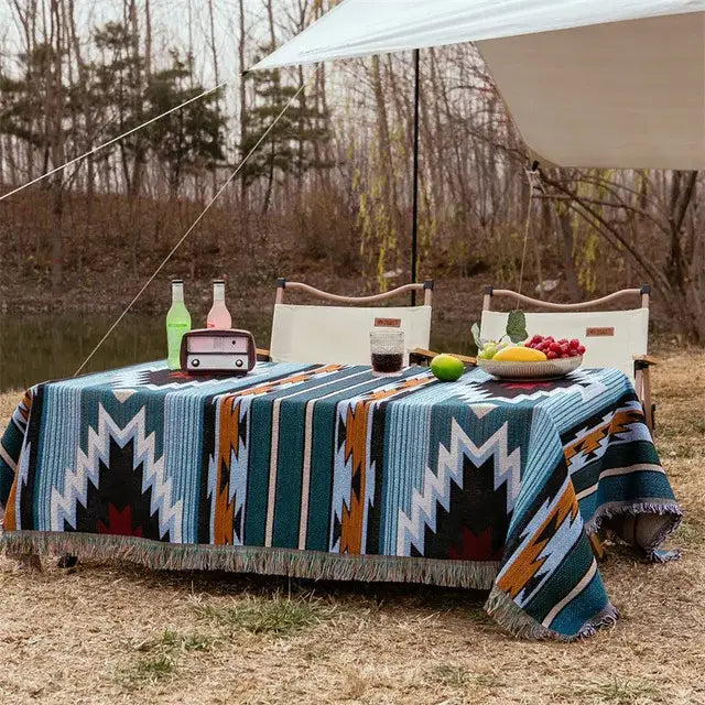 Teal white and orange geometric patterned woven vintage earth tone bohemian cotton plaid sofa blanket with fringed edges