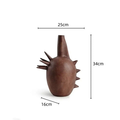 Brown ceramic geometric stoneware vase with rounded body and spiky details for vintage living room decorbites decorbites geometric stoneware