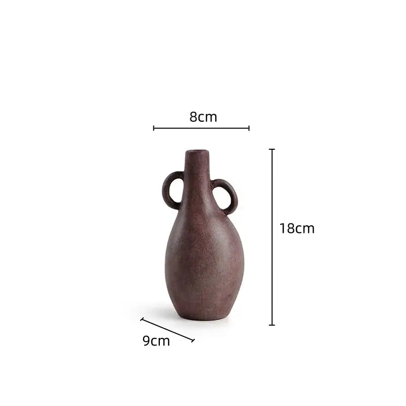 A dark brown ceramic geometric stoneware vase with two looped handles and slender neck for living room decorbites decor
