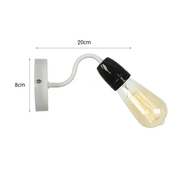 A sleek white wall lamp with a curved arm and exposed filament bulb featuring a black glass base for bedroom decorbites colorful ceramic led use