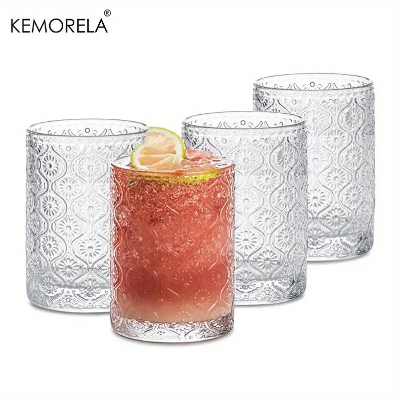 Clear vintage glassware set of blue red and gold embossed glass tumblers with intricate decorative patterns for dining room use