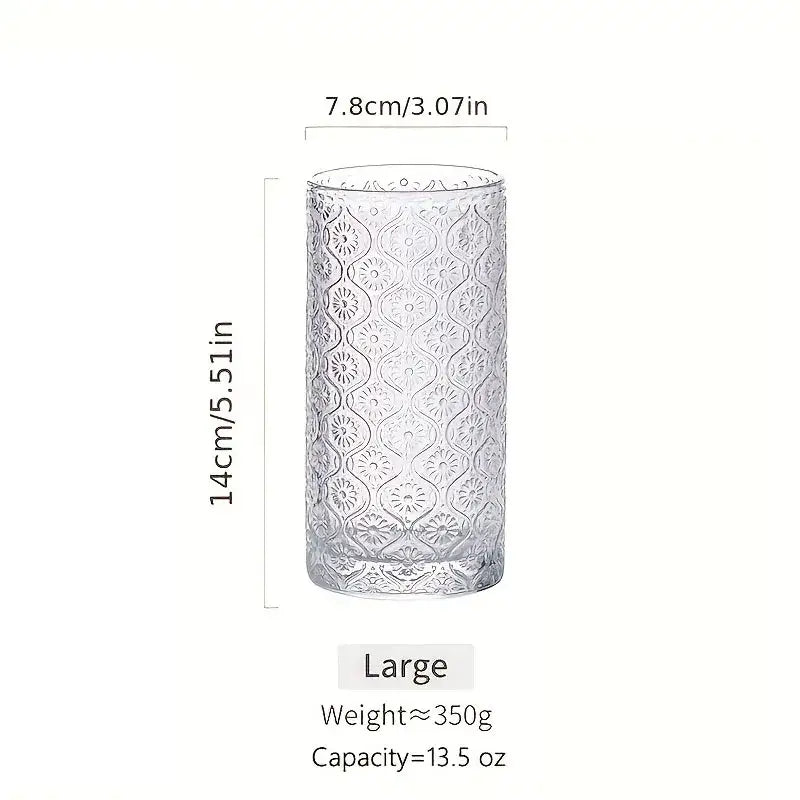 Clear glass vintage glassware tumbler with embossed geometric pattern part of blue red and gold glassware set