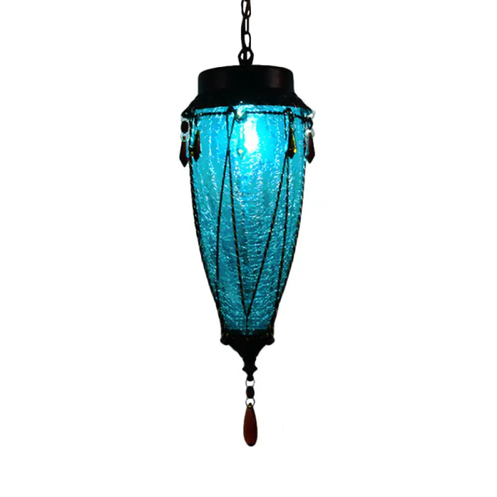 Turquoise textured glass pendant light with black metal accents and amber teardrop from decorbites vintage style fixture