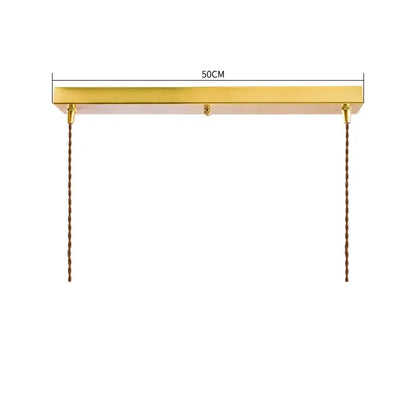 Gold finished rectangular pendant light with twisted brown cords featuring cracked glass by decorbites for living room decor