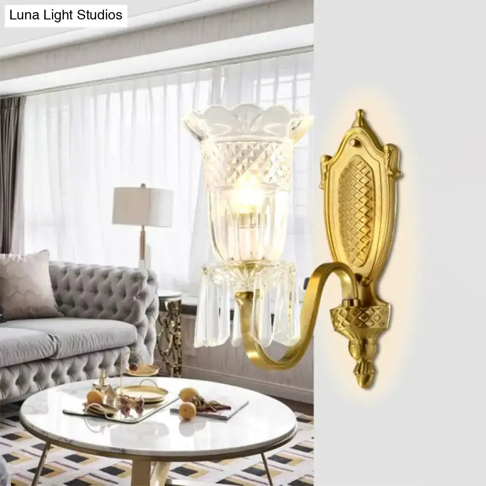 Gold-finished vintage floral wall light with faceted crystal glass shade and dangling crystal accents wall lamp for bedroom