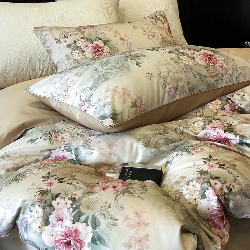 Cream-colored satin bedding set with vintage flowers print in soft pinks greens and muted blues for elegant bedrooms