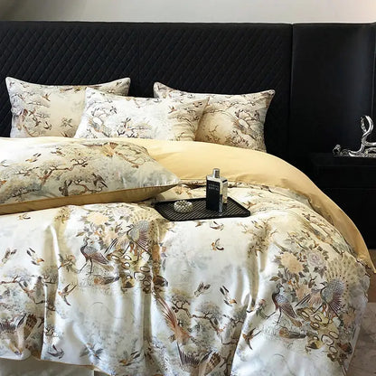 Elegant cream satin bedding set with vintage flowers print featuring intricate bird and floral patterns and gold lining