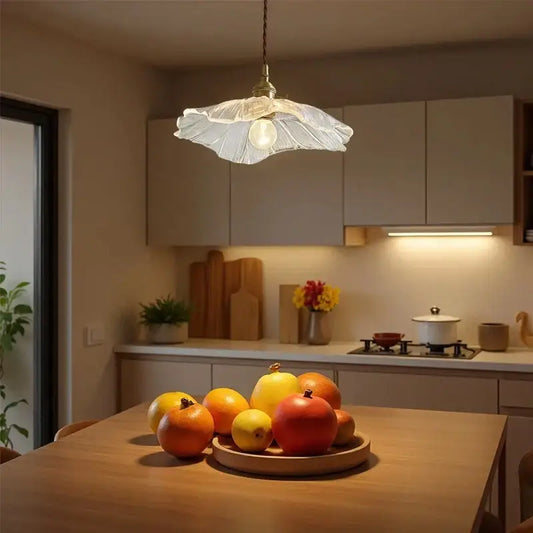 Vintage translucent glass pendant light with fluted petal design and glass construction for dining room use
