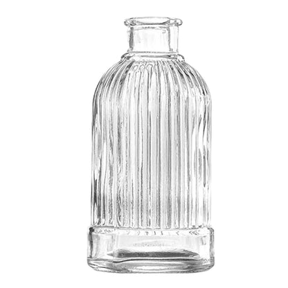 Clear glass vase with vertical ribbed texture and narrow neck for vintage plant pot decor and ornamental use