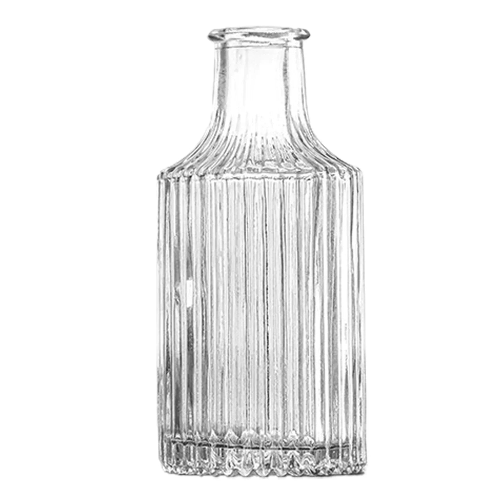 Vintage French clear glass vase with vertical ribbed texture and fluted base for elegant plant pot decor