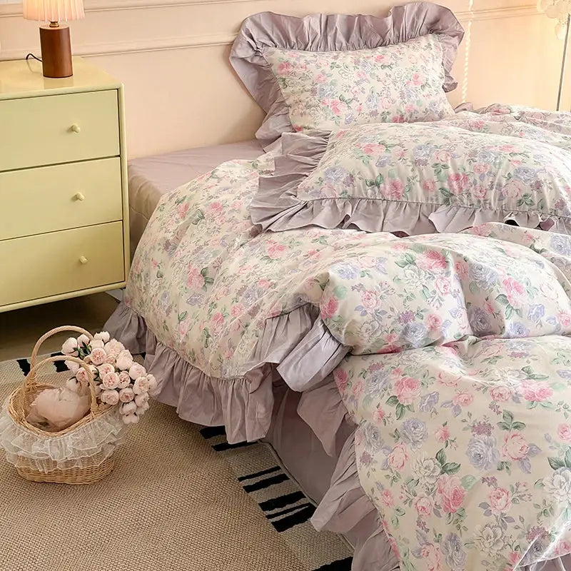 Floral-patterned vintage french floral cotton bedding set with pastel pink and lavender roses and lilac ruffled edges