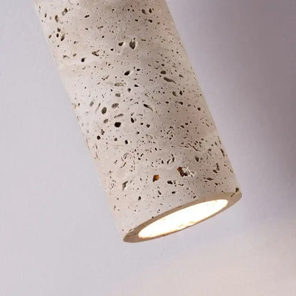 Vintage french stone pendant light with cylindrical concrete body and warm glow for dining room lighting