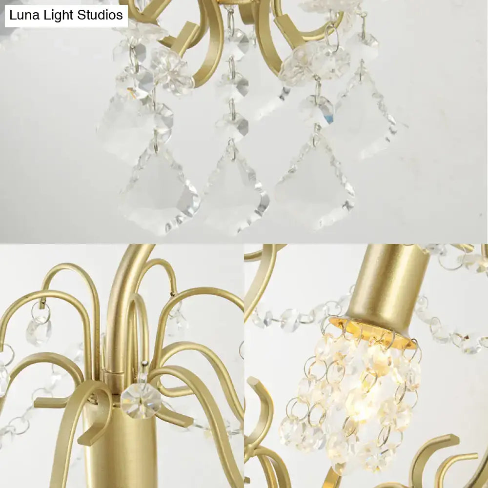 Vintage geometric gold finish wall lamp with clear crystal droplets and floral-shaped accents for bedroom lighting