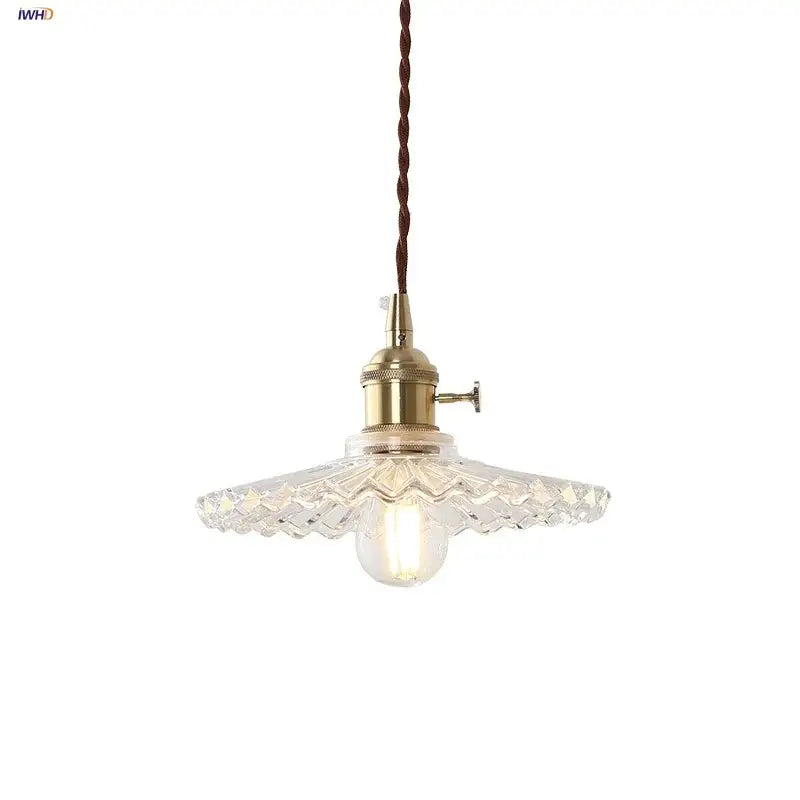Vintage glass copper led pendant lamp with brass metal fixture and faceted glass shade hanging from twisted cord