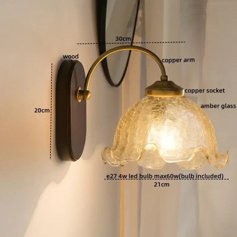 Vintage glass copper led wall lights featuring antique brass finish, textured amber glass shade, and wooden backplate for bedroom