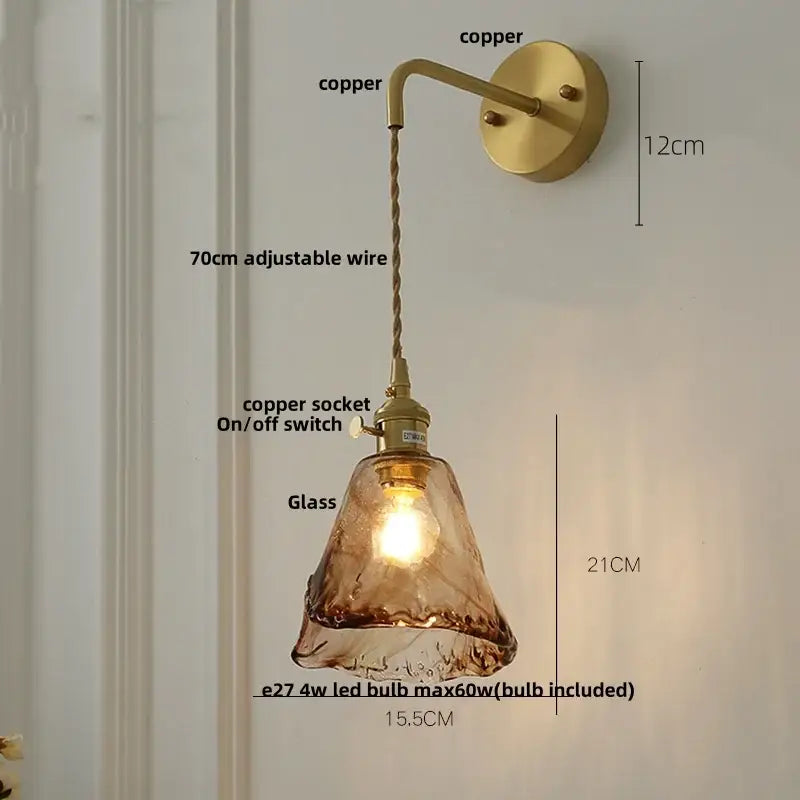 Antique brass-finished copper wall light with textured amber vintage led glass shade and adjustable 70cm wire for decorbites