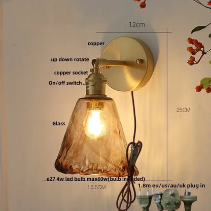 Copper-finished vintage gold wall light with textured amber glass shade and up-down rotating arm decorbites amber vintage led