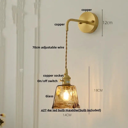 Vintage gold wall light featuring a copper sconce with decorbites amber vintage textured glass and adjustable twisted wire
