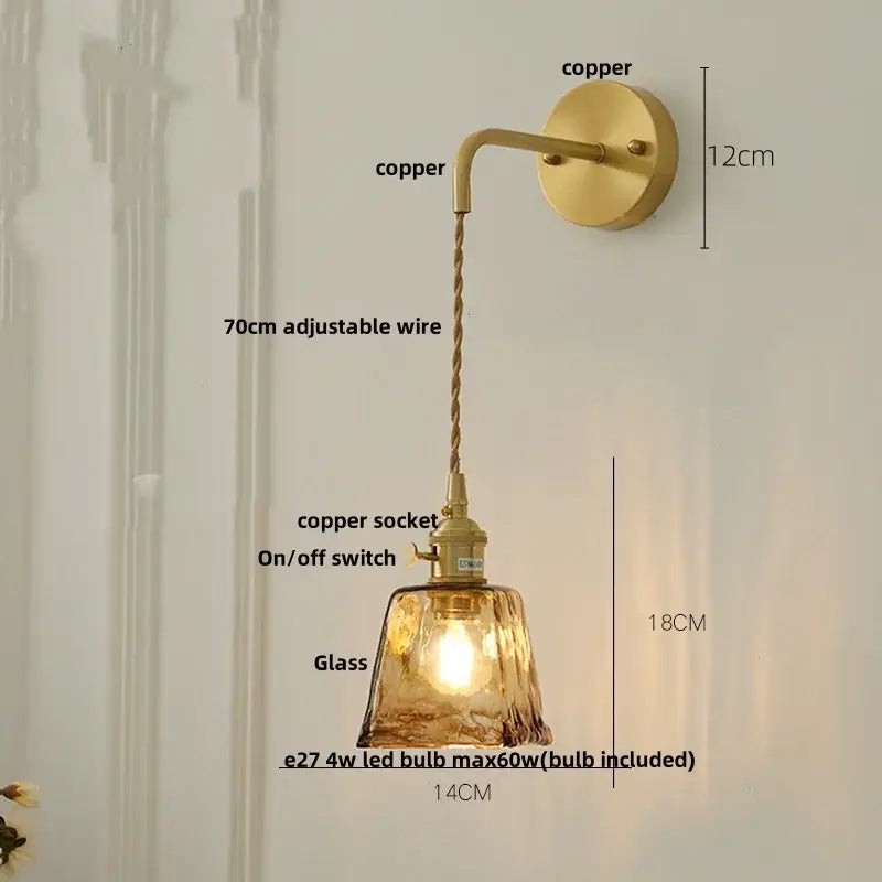 Vintage gold wall light featuring a copper sconce with decorbites amber vintage textured glass and adjustable twisted wire