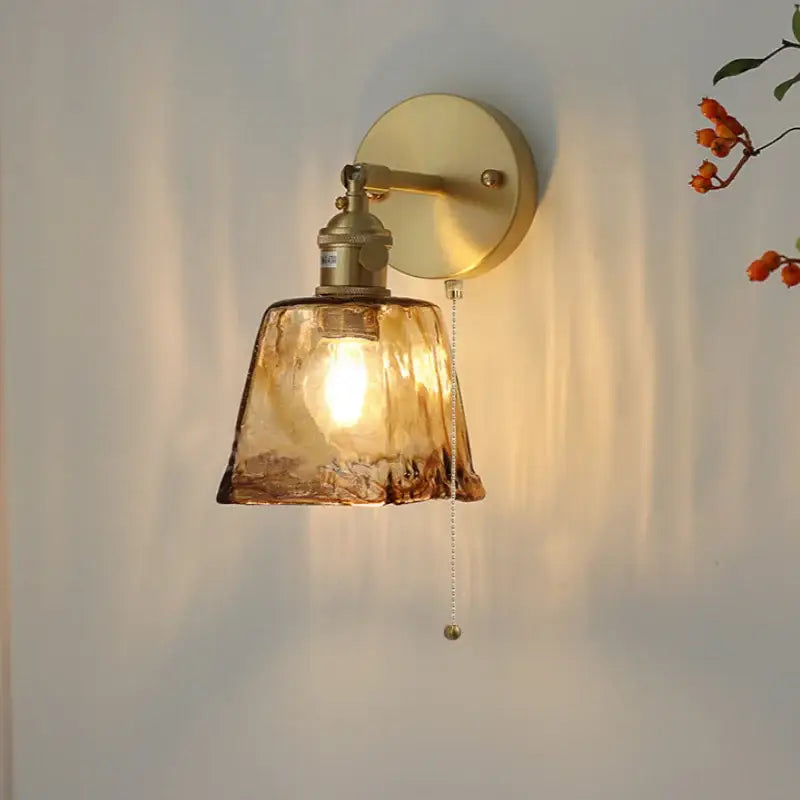 Warm amber vintage led wall light with textured glass lampshade and brass pull-chain fixture for bedroom decorbites amber vintage