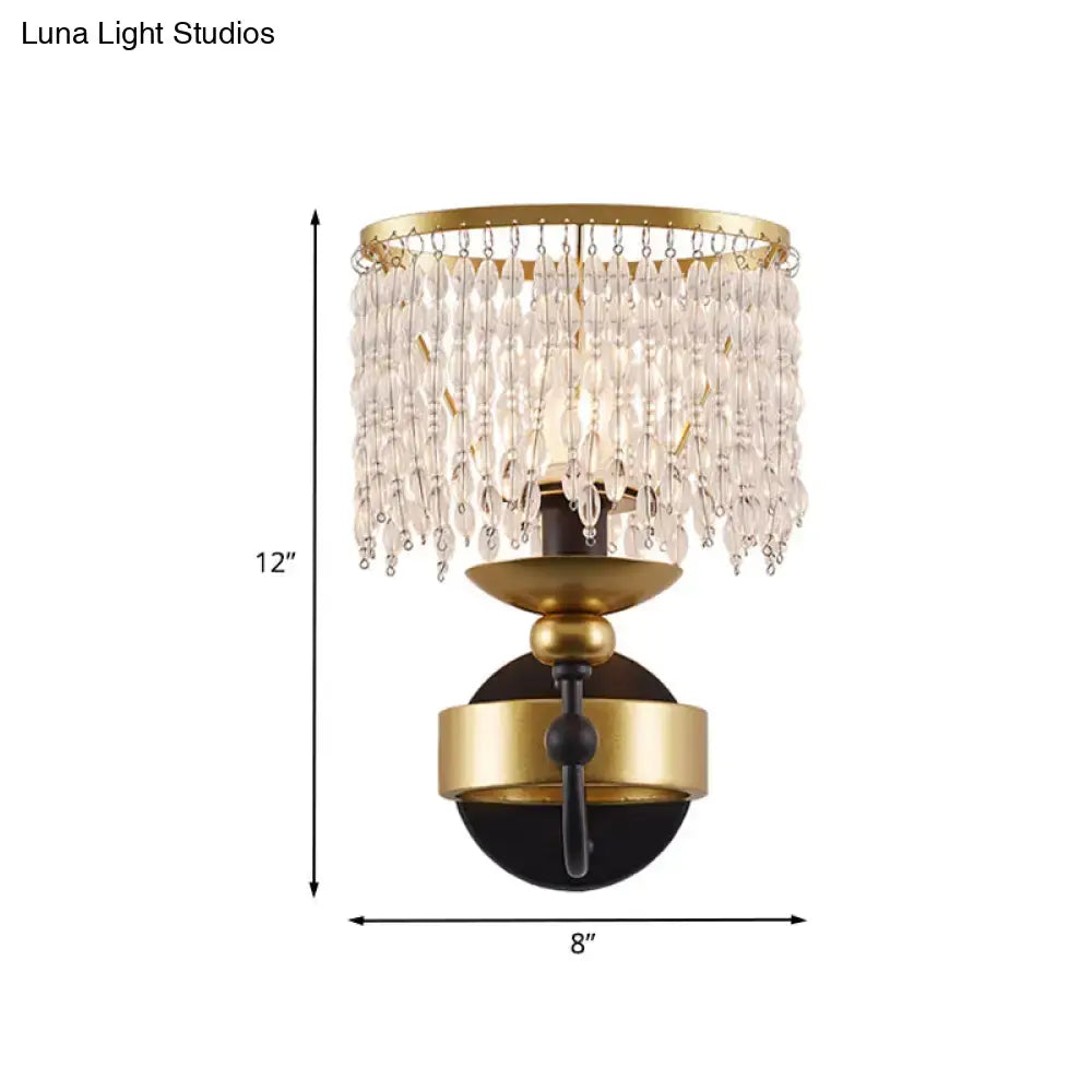Vintage gold and black crystal sconce wall light with cascading crystal beads and retro fringe drape design for bedroom