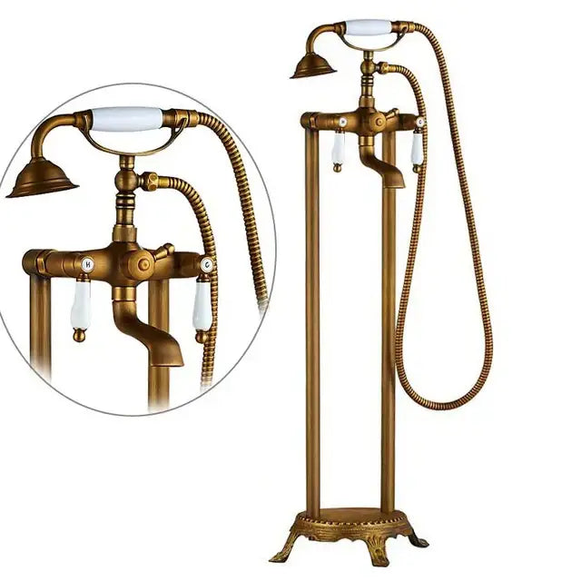 Antique brass vintage gold bath mixer tap with white ceramic handles and matching handheld showerhead for bathroom use