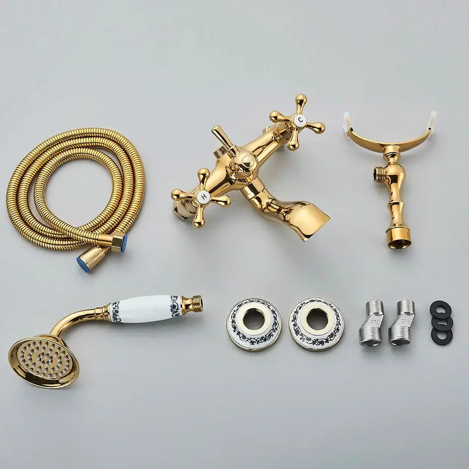 Vintage gold and black bathtub faucet set in brass with cross handles and white ceramic accents for decorbites golden black bathtub decor