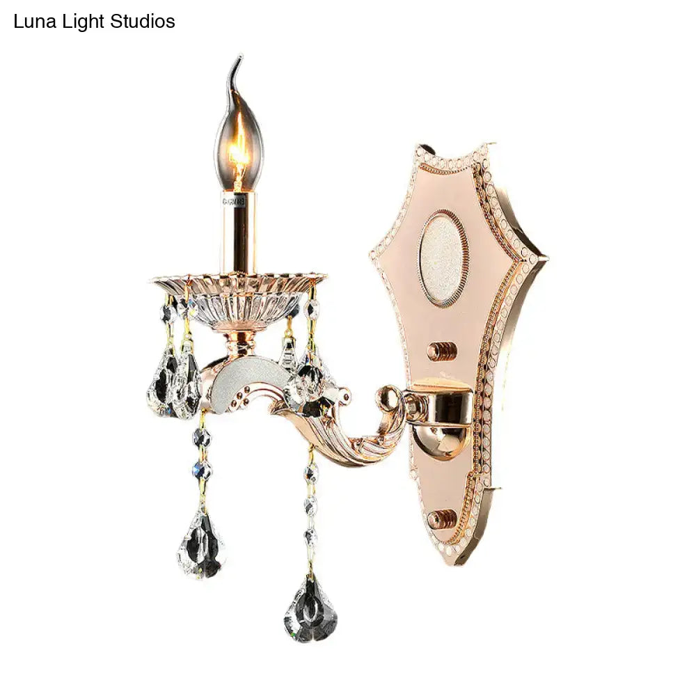 Rose gold ornate sconce light fixture with crystal teardrop pendants and frosted glass shield direct wired electric