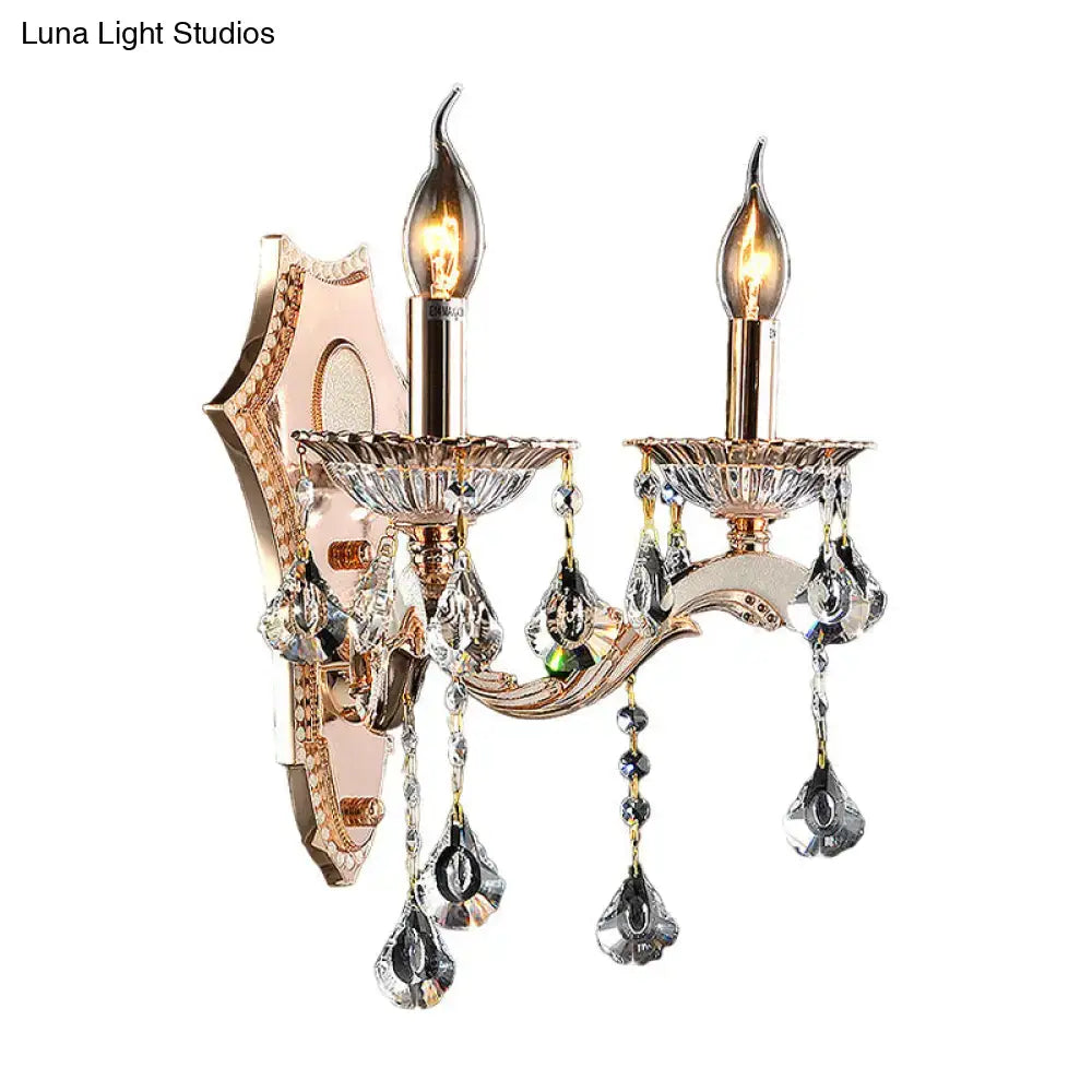 Vintage gold crystal sconce light fixture with two candle-style bulbs and teardrop crystals direct wired electric