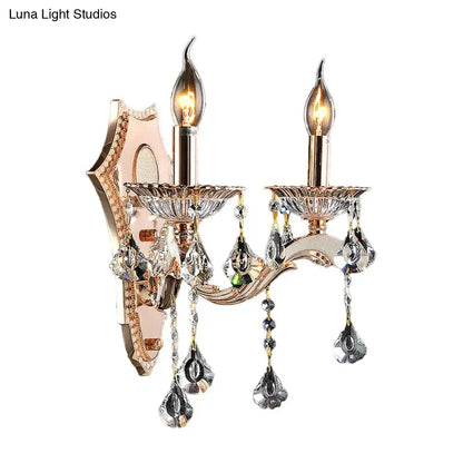 Vintage gold crystal sconce light fixture with two candle-style bulbs and teardrop crystals direct wired electric