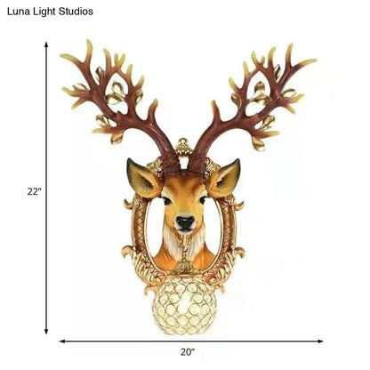 Vintage gold deer backplate crystal wall sconce with e26 e27 light featuring detailed deer head and illuminated globe base