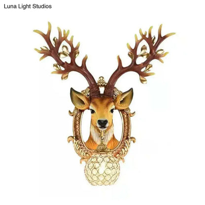 Ornate vintage gold deer backplate wall sconce with intricate antlers and textured crystal base e26 e27 light