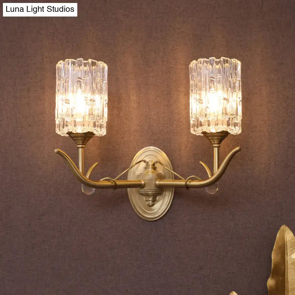 Antique brass two-light wall sconce with clear glass shades and gold finish for corridor 220v-240v use