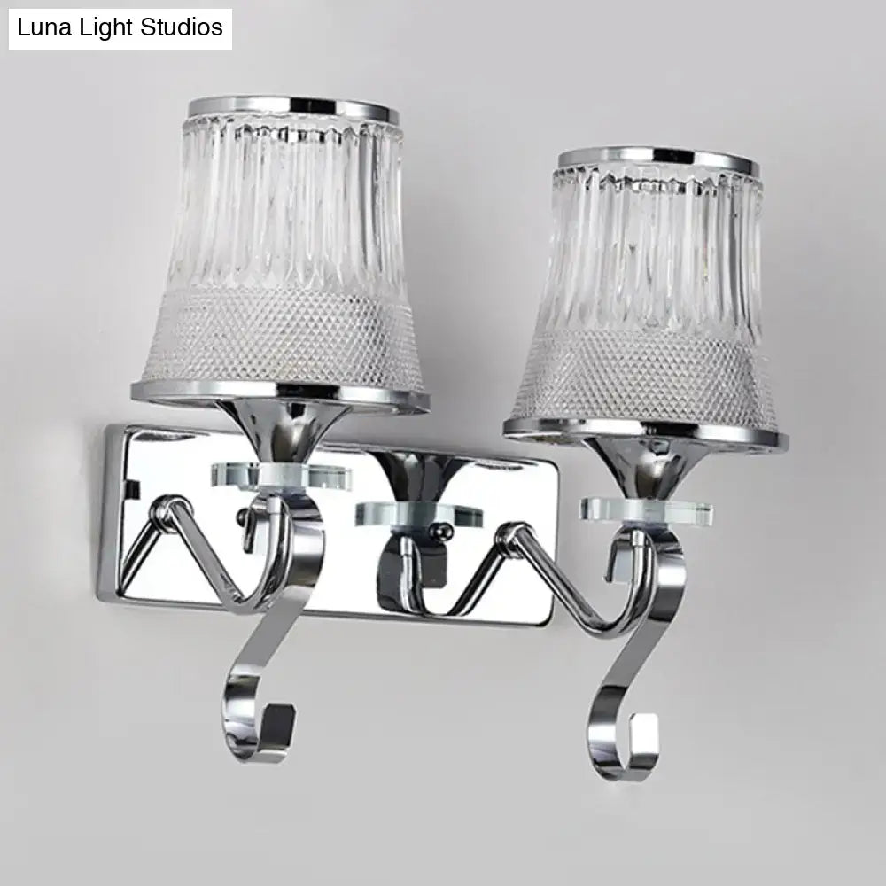 Vintage gold finish wall lamp with chrome frame and two clear glass ribbed shades for bedroom lighting