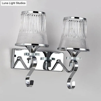 Vintage gold finish wall lamp with chrome frame and two clear glass ribbed shades for bedroom lighting