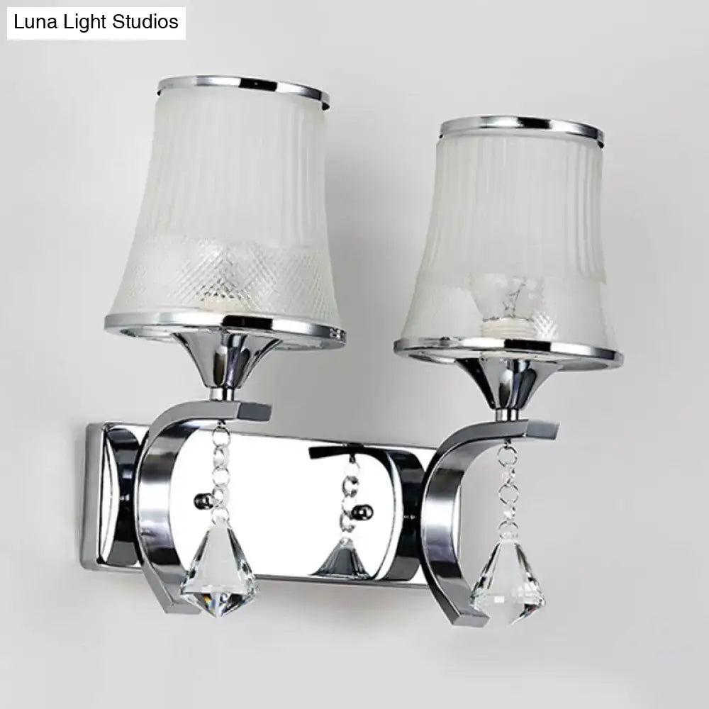 Vintage gold finish wall lamp with clear glass shades and chrome-finished crystal pendants for bedroom lighting