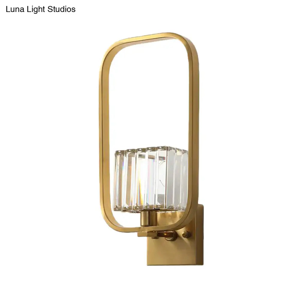 Vintage metal wall sconce with gold finish and crystal shade featuring clear faceted crystal rods for bedroom use