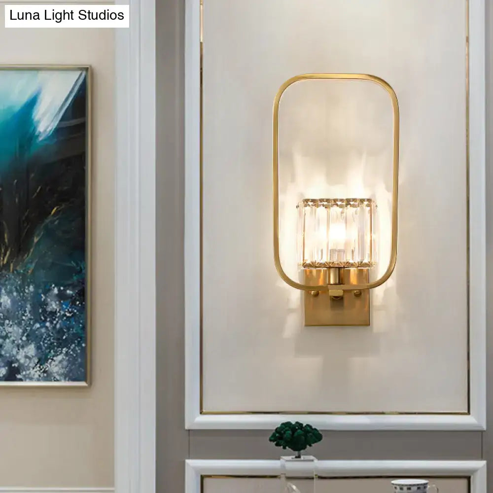 Vintage gold finish metal wall sconce with crystal shade featuring rectangular glass and vertical crystal accents